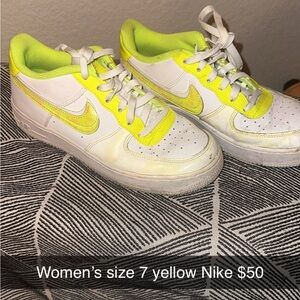 Nike White and Yellow Athletic Shoes with Bold Design